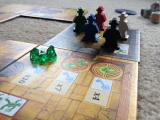 Escape: The Curse of the Temple board game meeples