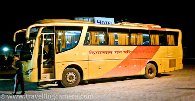 In October I was in Shimla and was coming back to Delhi in Night Bus. I reached new bus stand at 8:00 pm while bus had to start at 9:20 pm. New Bus Stand in Shimla is fabulous and I thought of doing some mobilegiri there... Above photograph was taken during day time while I was at Indian Institute of Advanced Studies, but shot is taken by HTC Desire Camera :) Before I start sharing photographs of Shimla Bus Stand, let me share something about HRTC services, which have improved a lot in my opinion. Now HRTC have Volvos, TATA-AC and Deluxe buses running between main stations in Himachal. Most of these buses are very comfortable. I don't think, I need to tell anything about Volvos, but at the same time TATA-AC are decent buses with confortable seating and AC. Main different is brand and the other can felt while in hills. So if you go to Shimla from Delhi, it would be hard to feel the difference between Volvo and Tata-AC, as road is wonderful. Deluxe buses have comfortable seating but no AC. Apart from that most of the TATA-AC and Volvos have got LCDs for running movies or other videos...Shimla Bus-stand has different parking areas located at different levels of this building. This particular area seems for Haryana buses and with time, all types of buses can be seen on a particular stand. So all of these buses would move to respective counter as they have to start for their next destinations.Here is the area with most of the hustle-bussle, as all passengers are looking for their buses and boarding accordingly.There is more than enough space inside the Bus-Stand to sit and wait. All the levels of this bus stand are clean as of now and well maintained. Hope Himachal Pradesh government and employees keep this going in same fashion.There are clean and appropriate options for eatable & drinks...All current and advanced booking counters are located on ground floor. Temporary counters are also available near the place where buses are parked to pick passengers.If someone is sitting inside the bus-stand and waiting for the bus, s/he need not to go outside to see if bus has come or not. Whole area is covered with transparent glass.Apart from that, LED displays are also installed at most of the places. These LED displays show the buses currently on counter with respective information like Departure time, Counter Number, Bus Number etc.Most of the levels are connected through stairs as well as lifts. I didn't come across any escalator, which was a bit surprising thing.Here is a photograph of frontal portion of new bus stand of Shimla, which is located near Tootikandi...This is a huge area and Shimla's new bus stand is considered as one of the best bus-stands in North India. In fact Delhi's Bus Stand is under renovation, so let's see how it turn out.From entry of this Bus stand, it looks like some shopping Mall or a very luxurious office space. It was hard to digest the fact that it's Bus Stand of Capital City of Himachal Pradesh :)Bokeh of colorful lights on surrounding hills...HRTC Buses can be booked online now at www.hrtc.gov.in/ . It's really very helpful for folks to see availability online and book their tickets without waiting in long queues.This was old Bus-stand of shimla, which has been converted into local bus-stand now. There are regular shuttles between local Bus Stand and ISBT Shimla.