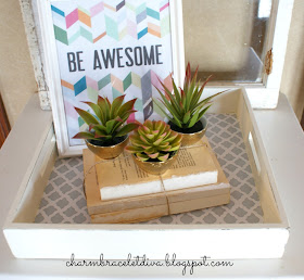 Store cacti in Target golden bowls on book bundles on quatrefoil tray