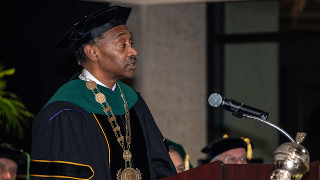 Dr. Jonathan Woodson delivers remarks during the investiture ceremony on Nov. 30, explaining his commitment to developing a culture of respect, diversity, and inclusion, and expressing his enthusiasm for the future of the university. (Photo credit: Tom Balfour, USU)