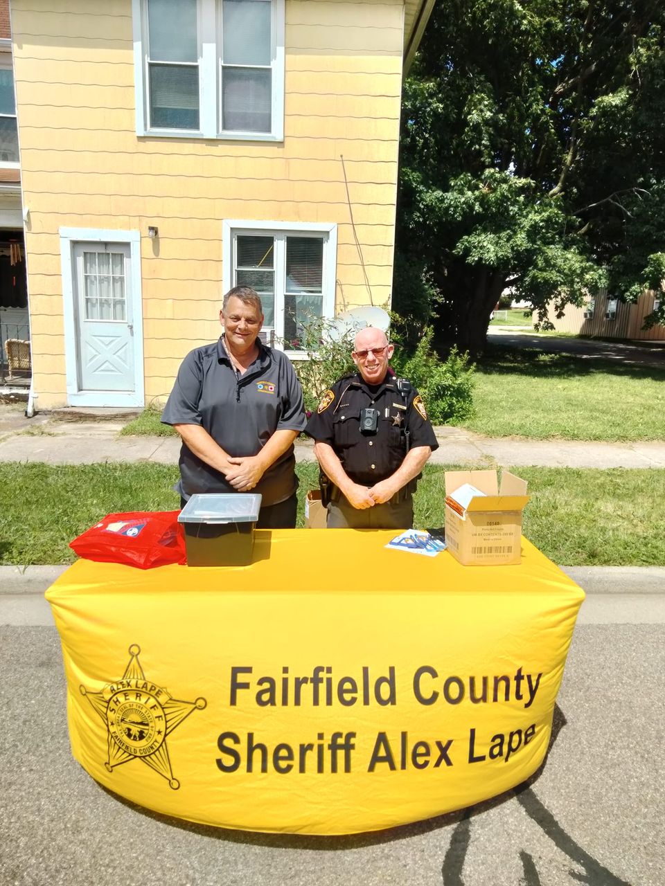 sheriffs standing at sheriff's event table