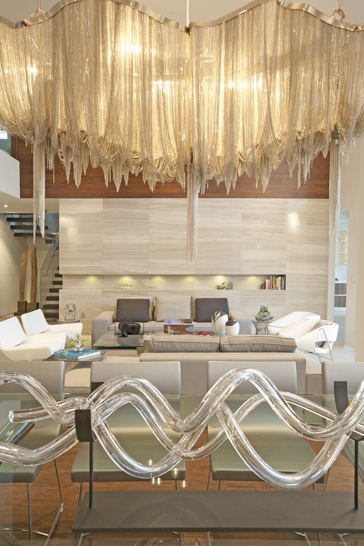 Living room in Modern home by DKOR Interiors