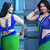 Ashwini Sri Milky Navel Exposed In Green Sleeveless Saree..