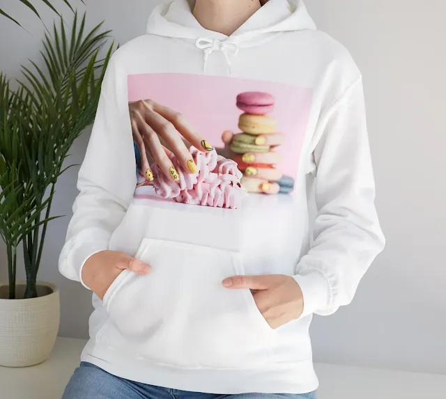 A Hoodie With Woman's Yellow Nail, Designed With Nail Art