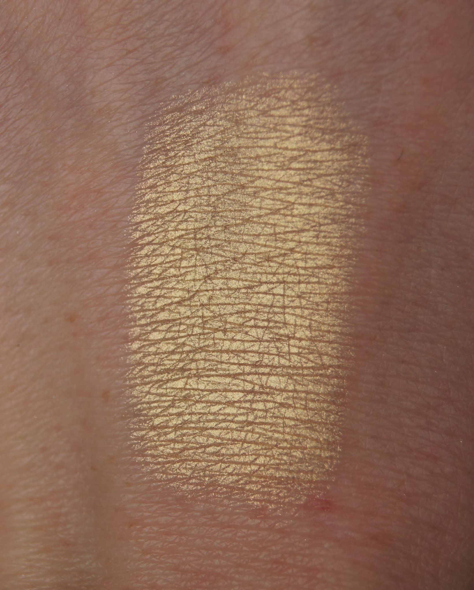 topshop sunbeam highlighter swatch