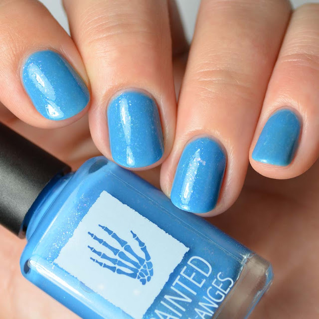 blue nail polish with flakies