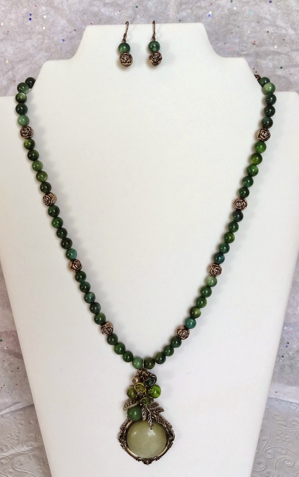 https://www.etsy.com/listing/204515295/frosty-green-cabonchon-necklace-and