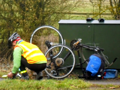 man fixing wheel