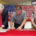 Tony Stewart Signs First Flag for “Express Your Thanks” Program to Benefit Wounded Warrior Project at Bank of America 500