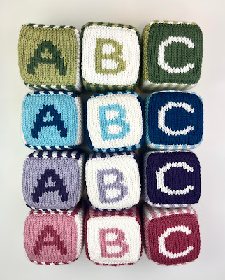hand knit abc 123 foam blocks in green, blue, purple, pink and white