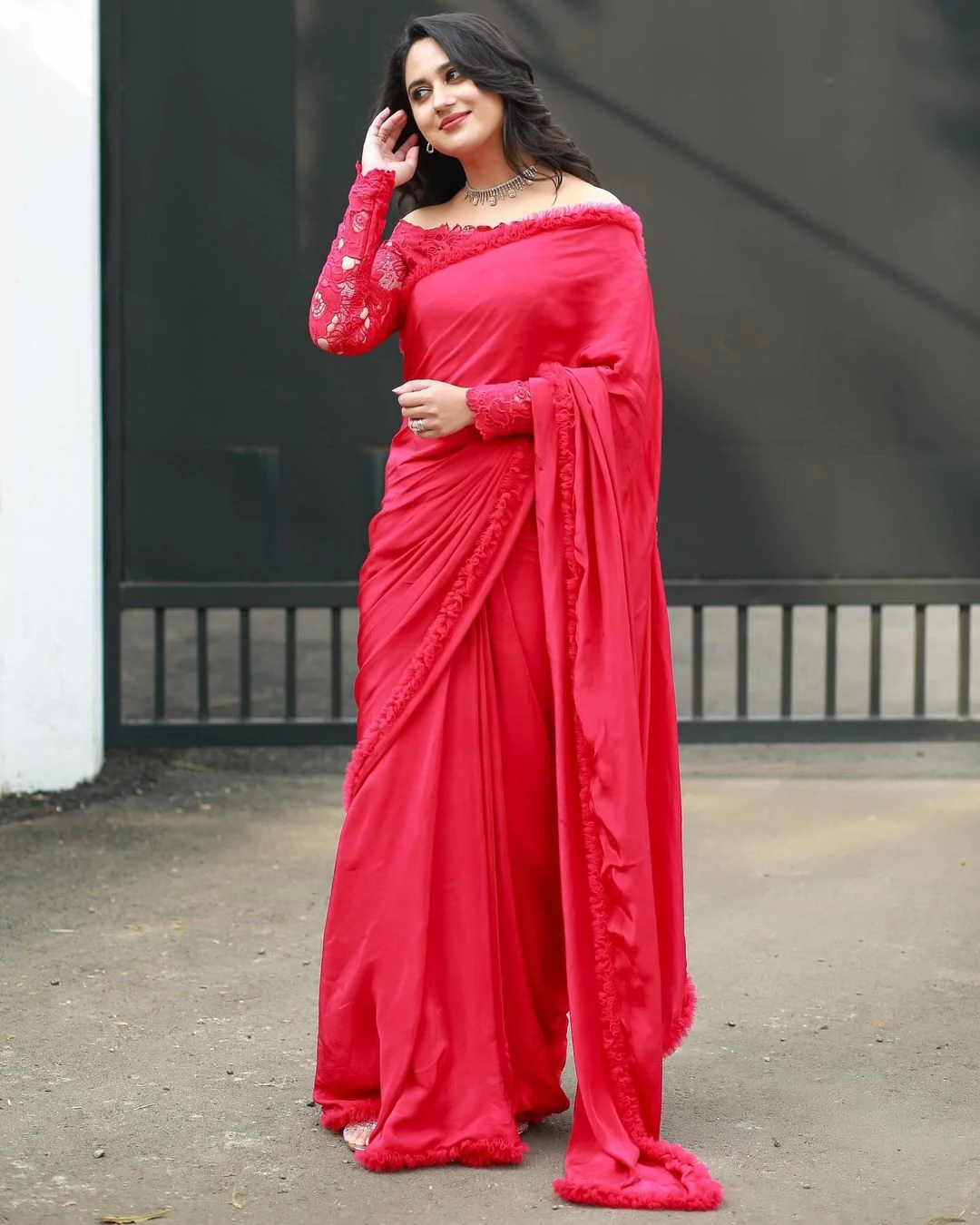 Actress Miya George cute looks in red saree photoshoot