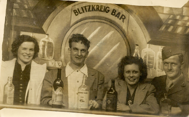 Cousins Ralph "Bucky" Moore and Jack O'Hare with their wives, Theresa (left) and Martha (right) pose at the "Blitzkreig Bar", c. 1945, taken in New York while Jack was on furlough.