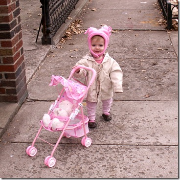 Elaine pushing the dolly stroller outside