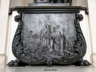 Bronze relief of the siege of Corfe Castle,  in the house at Kingston Lacy