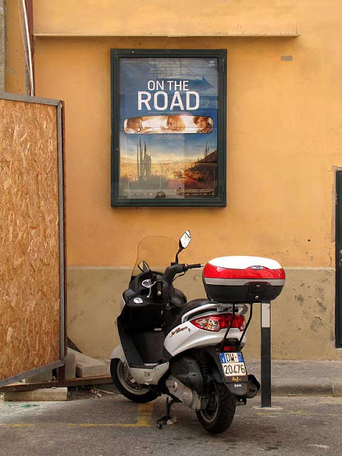 Scooter parked outside the Kino Dessé, Livorno