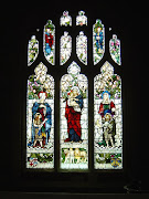 When she died back in England Pease had a memorial stained glass window .