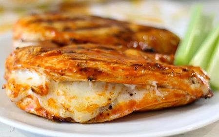 Grilled Buffalo Chicken Stuffed With Mozzarella Cheese.