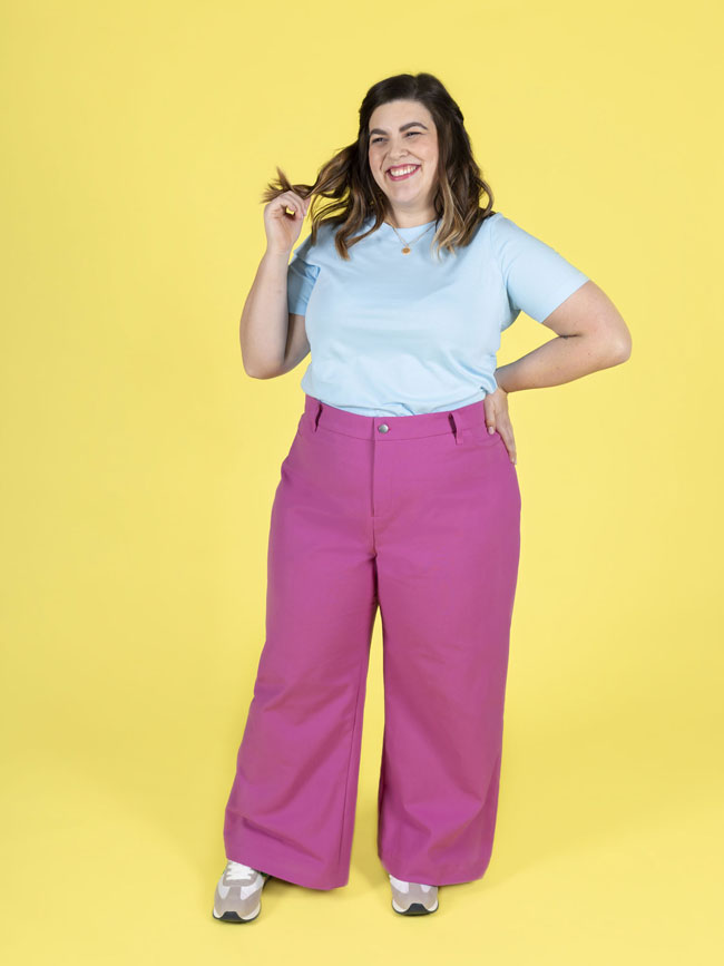 Model wears hot pink wide leg trousers