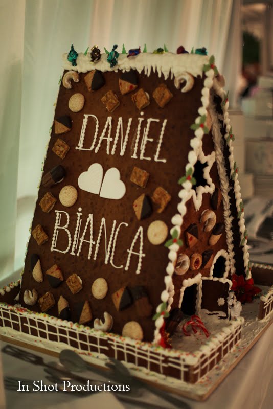  had a lovely wedding cake but they also had a gingerbread house