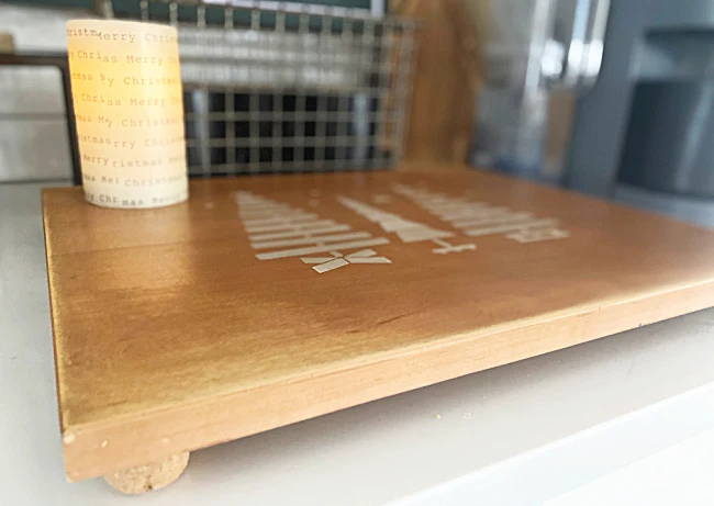 side view of cutting board with feet