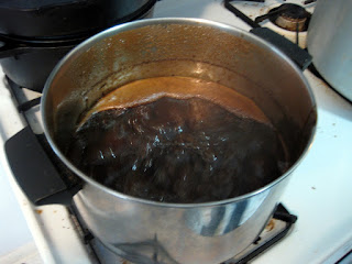 Reducing the first runnings from the Scottish Stout on the stove.