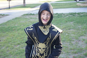 Mister Man giggling about his awesome skull ninja costume