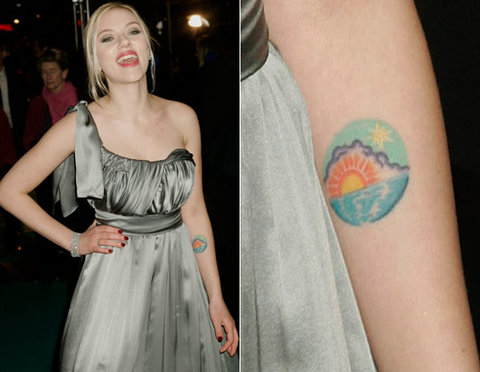  which is located on her left forearm. Its a tattoo of a lovely sunrise, 