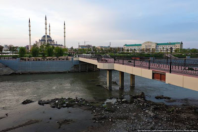 The Akhmad Kadyrov Mosque (Russian — Mechet Akhmata Kadyrova) is located in Grozny, the capital of Chechnya. It is one of the largest mosques in Russia and is officially known as the "The Heart of Chechnya" , Russian — Serdtse Chechni). The mosque is named after Akhmad Kadyrov who commissioned its construction from the mayor of Konya. The mosque design with a set of 62-metre (203 ft)-tall minarets is based on the Blue Mosque in Istanbul. On October 16, 2008, the mosque was officially opened in a ceremony in which Chechen leader Ramzan Kadyrov spoke and was with Russian Prime Minister Vladimir Putin. In this mosque, ten thousand Muslims can pray at a time and its minarets reach 62 metres (203 ft) high.