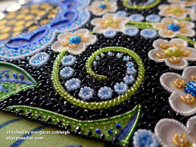Part of the black beaded background waiting to be couched. (Wild Child Japanese Bead Embroidery by Mary Alice Sinton)