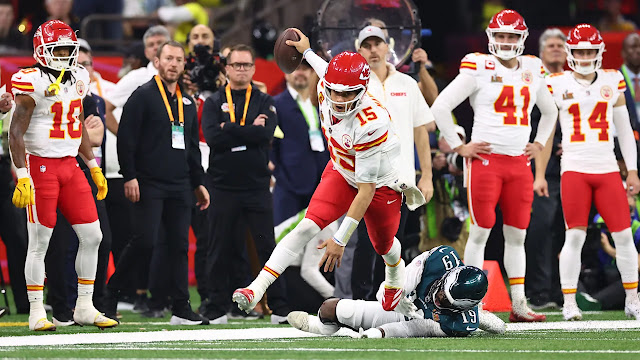 Kansas City Chiefs QB Patrick Mahomes getting tackled.