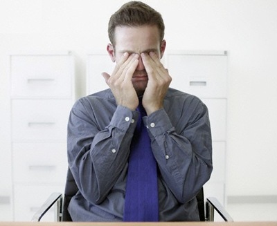 Sleepy Businessman --- Image by © Roy McMahon/Corbis