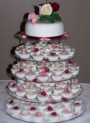 Wedding cakes on a cupcake tower style is considered an alternative to the