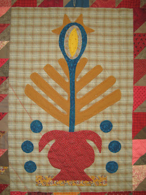 Volunteer Bloom and Berries in Linda Brannock's Flowers quilt