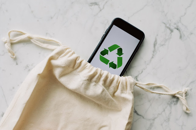 Mobile Phone with Recycling Logo in Cloth Bag