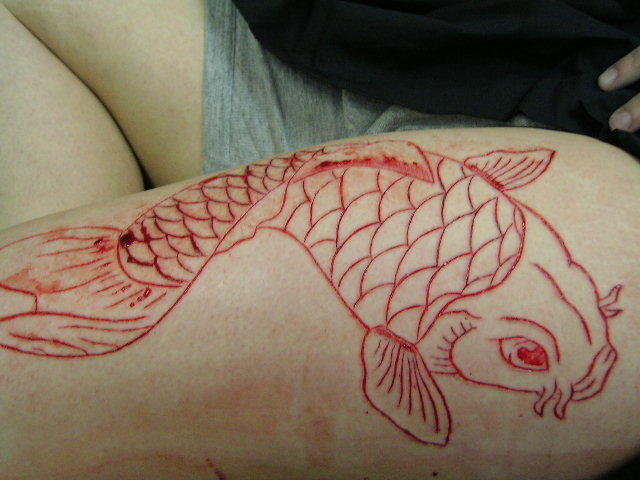 25 Insane Scarification Tattoos