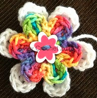 http://www.ravelry.com/patterns/library/layered-button-flower-accent