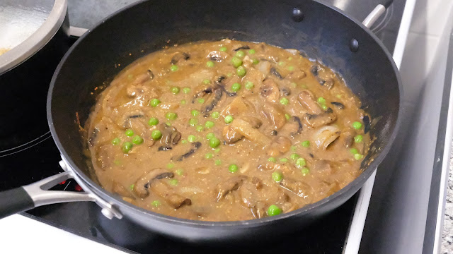 Mushroom Stroganoff in a large black frying pan