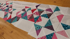 Heart quilt with quarter square triangles