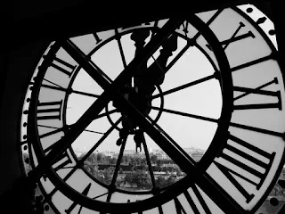 a photo taken from behind a tower clock.