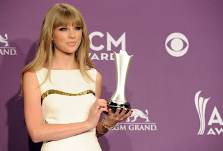 Taylor Swift Long Straight Haircut with Bangs