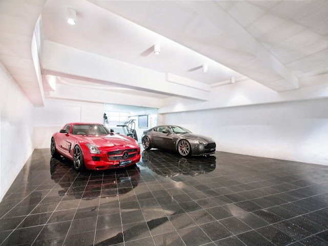 Two cars in large garage