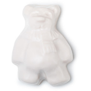 A bright white bear shaped soap on a bright background