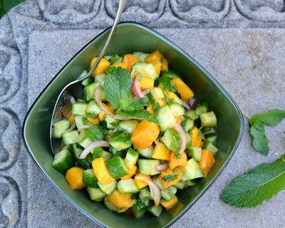 Cucumber-Mango Salad, another favorite summer salad ♥ KitchenParade.com with tiny spikes of honey & hot sauce.