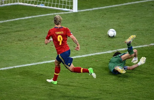 Spanish forward Fernando Torres scores his third goal in the Euro 2012 to win the Golden Boot award