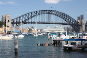 . looking across the bay to the Sydney Harbour Bridge, Luna Park, . (lavender bay cruiser)