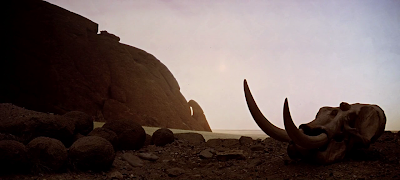 The Dawn of Man, Arid landscape inhabited by ape-like hominids, 2001: A space Odyssey (1968), directed by Stanley Kubrick 