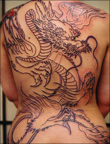 dragon design and adding the tribal influences, a large tattoo would be