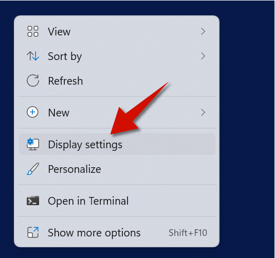 The first step is to open the display settings. You can do this by right-clicking an empty spot on the desktop.