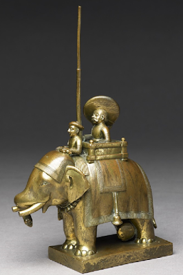soldier with elephant and driver