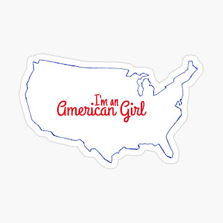 A sticker with the words "I'm an American Girl" within the outline of a map of the United States